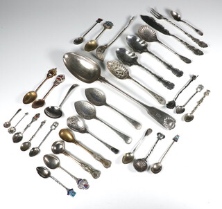 Three silver teaspoons and a small collection of plated cutlery