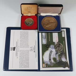 A commemorative bronze Nassa medallion and 2 others 