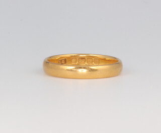 A 22ct yellow gold wedding band 2.8 grams, size K  