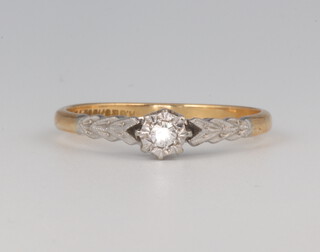 An 18ct yellow gold illusion set single stone diamond ring approx. 0.04ct, 2.3 grams, size Q 