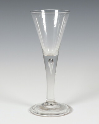 A 19th Century glass cordial with air bubble stem and folded foot 20cm 