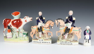 A pair of Staffordshire figures - Sir George Brown and General Pelissier 20cm, ditto Napoleon and a cow spill vase 