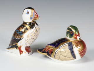 A Royal Crown Derby Imari pattern Pelican paperweight with gold stopper, a ditto of a Carolina Duck gold stopper, 12cm and both boxed 