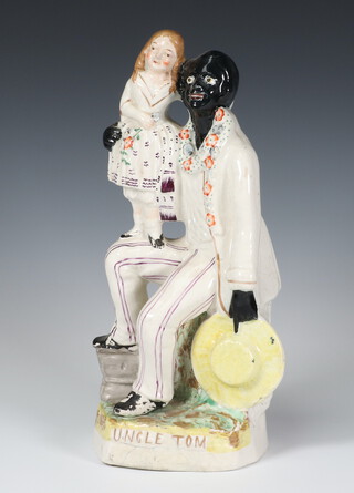 A Victorian Staffordshire figure Uncle Tom 26cm 