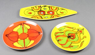 A mid-Century Poole yellow ground dish 43cm and 2 plates 26cm 