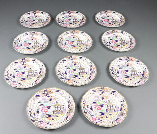 Eleven Victorian Imari pattern plates decorated with flowers 22cm 