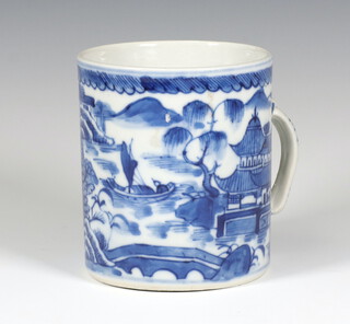 A 19th Century Chinese blue and white mug with an extensive landscape scene 10cm 