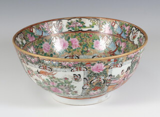 A famille rose Chinese deep bowl decorated with figures in a pavilion enclosed by a band of flowers and insects 26cm 