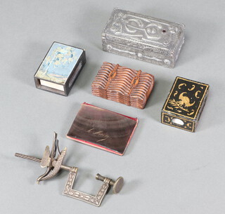 A Victorian gilt metal sewing clamp in the form of a bird 13cm, a carved wooden vesta case in the form of a trunk 3cm x 7cm x 4cm (hinge f), an Art Nouveau style embossed pewter box 4cm x 10cm x 5cm, 2 wooden match boxes and a mother of pearl covered needle case 