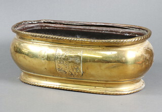 A Dutch oval embossed jardiniere with armorial decoration 12cm x 33cm x 15cm 