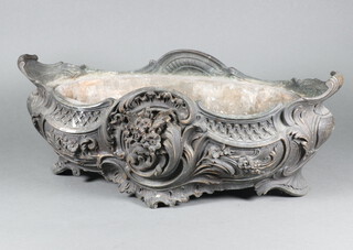 A French 19th/20th Century Rococo style cast bronze boat shaped planter with floral decoration, raised on panelled supports complete with metal liner 17cm h x 48cm w x 21cm d  