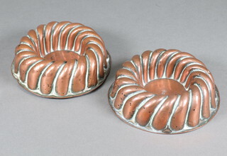 Benham, a pair of Victorian circular squat copper moulds 5cm x 14cm, both with sceptre marks 