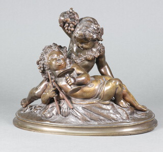 A 19th Century bronze figure group of 2 reclining cherubs raised on a demi-lune base 18cm h x 22cm w x 11cm d  