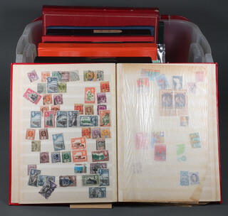 A Royal Mint stock book of used GB stamps, a stock book of world stamps, album of Elizabeth II commonwealth stamps including Pitcairn Islands, Gibraltar, Canada, Turks and Caicos, 6 ring bound albums of mint and used world stamps - GB, Austria, Canada, Belgium, Czechoslovakia, South Africa, America 