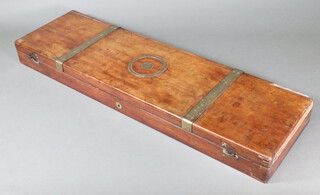 A 19th Century rectangular mahogany and brass banded fitted shot gun case, the lid marked George Fuller Gun Maker London with brass countersunk handle marked Chas Colby Esquire 8cm h x 82cm w x 24cm d  