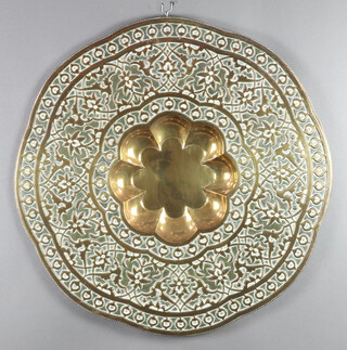 A circular Eastern embossed brass charger 78cm diam. 