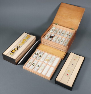 A collection of 93 1940's microscopic slides contained in a shallow oak box together with 100 other slides in 2 shallow boxes  