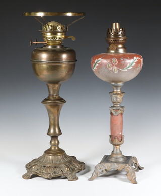 A Victorian opaque glass oil lamp reservoir raised on a marble effect and silvered metal column 45cm h (no shade or chimney) together with a gilt metal oil lamp raised on a circular pierced base 44cm x 20cm 