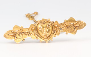 An Edwardian 15ct Etruscan style bar brooch 3.7 grams gross