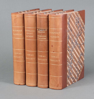 Smollett Tobias, 4 volumes including "The Expedition of Humphrey Clinker", "The Life and  Adventures of Sir Launcelot Greaves", "The History and Adventures of an Atom", "The Adventures of Ferdinand Count Fathom" and "The Adventures of Roderick Random", all 8vo., 3/4 bound in polished brown calf with gilt spines and marbled boards 