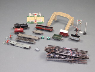 A collection of Dublo to include locomotives, rolling stock, platform, signalling equipment, gate and track 