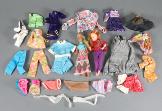 A Pallitoy Pippa Marie doll together with a Little Miss Dollikin doll and a collection of 16cm high doll outfits 