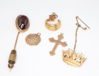 A 9ct yellow gold Naval crown brooch, a tie pin, charm, cross pendant and earring, gross weight 10.6 grams 