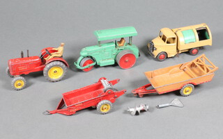 Dinky Toys, a collection of farm and commercial vehicles to include Massey Harris manure spreader, Halesowen farm trailer, Aveling-Barford steam roller Massey Harris tractor and a Bedford refuse wagon 