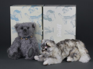 A Steiff limited edition bear Bell Boy no. 1724 of 2000 40cm boxed and with certificate and 1 other Lizzy Maine Coon Cat no.00773 of 3000 36cm boxed and with certificate 