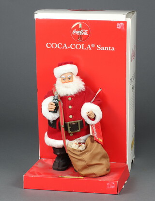 A Steiff limited edition Coca Cola Santa no. 01387 of 10000 boxed   