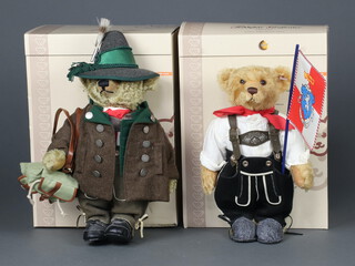 A Steiff limited edition bear Hunter Teddy Bear brass-coloured no.213 of 500, 35cm, complete with bag, boxed and certificate and 1 other Grandfather Bear with flag no.213 of 500 36cm, boxed and with certificate 