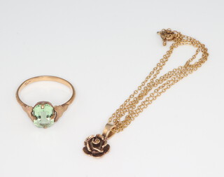 A 9ct yellow gold peridot ring together with a ditto pendant and chain 3.3 grams 