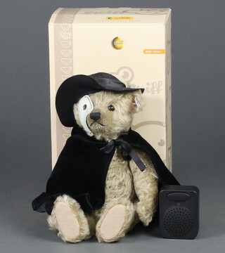 A Steiff limited edition Phantom of the Opera teddy bear no.73 of 2000, 30cm together with a voice controlled musical box, boxed  