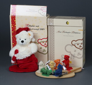 A Steiff limited edition Mini Colour Splash teddy bear no.601 of 2006 9cm boxed and with certificate together with Teddy Bear with Christmas Stocking 2005 No. 1053 of 5000 14cm 