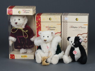 A Steiff limited edition Christmas teddy bear no. 1339 of 2000, 30cm, boxed and with certificate, a Steiff Christmas teddy bear No.1555 of 2006 30cm  boxed, 1 other Pierrot no. 1384 of 2006 26cm, boxed and with certificate 