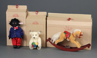 A Steiff limited edition Exhibition bear, white, 21cm no.1108 of 1500, Steiff Golly Boy no.1249 of 2000 27cm, and 1 other Rocking Horse no.252 of 2000, 39cm, all boxed and with certificates   