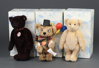 A Steiff limited edition Teddy Bear, dark red, no.606 of 2009 32cm boxed and with certificate, 1 other Handkerchief Bear boxed (no certificate) 31cm and Teddy Bear Krystopher blonde, with star pendant, boxed 