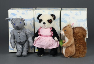 A Steiff North American Edition limited edition bear Tin Man from the Wizard of Oz no.1125 of 1939 boxed and with certificate, 1 other Steiff limited edition Soo Sooty Bear no.65 of 2000 boxed with certificate and a Musical Squirrel 23cm boxed (no certificate) 