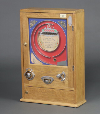 An Allwin Deluxe pinball machine in an oak and ply cabinet, with original mechanism and restored facade, in working order 72cm h x 48cm w x 18cm d