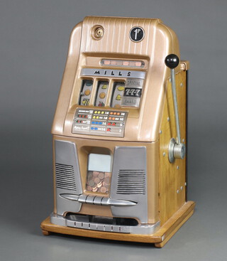 A restored and refurbished iron Mills One Armed Bandit 1p fruit machine, in working order 68cm h x 41cm w x 39cm d  