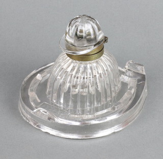 A novelty moulded glass inkwell in the form of a jockey's hat and horseshoe with white metal mounts 12cm 