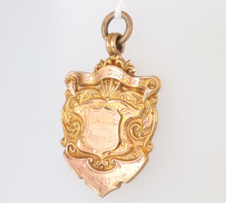 A 9ct yellow gold sports fob 10.6 grams 