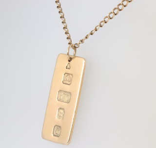 A 9ct yellow gold ingot on a 9ct yellow gold chain 48cm, 14.4 grams 