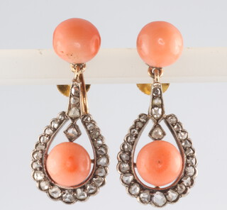 A pair of Victorian yellow metal coral and diamond drop ear clips, 27mm, 5.23 grams (one diamond is chipped) 
