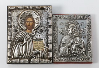 A 20th Century icon with a printed bust of Christ contained in a white metal oklad 10cm x 7.5cm and a ditto The Virgin and child contained in a white repousse oklad 8.5cm x 7cm 