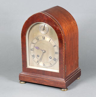 A striking bracket clock with 14cm arched dial, Roman numerals contained in an inlaid mahogany case, the back marked J.J.E England, raised on 4 brass bun feet 30cm h x 20cm w x 15cm d, complete with pendulum 
