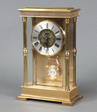 W and J Schmitz Schlenker Junior, an 8 day German striking mantel clock, the 9cm gilt dial with silvered chapter ring, marked ACCTIM, striking on bell and contained in a gilt metal case 26cm h x 17cm w x 9cm d 