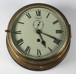 A Swiss made ward room style clock, the 14cm painted dial with Roman numerals and subsidiary second hand, contained in gilt case 9cm x 18cm 