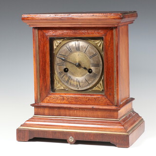 A Hamburg American Clock Company striking mantel clock with 16cm gilt dial, silvered chapter ring, Roman numerals, contained in a mahogany case, complete with pendulum but no key, 29cm h x 26cm w x 16cm d 