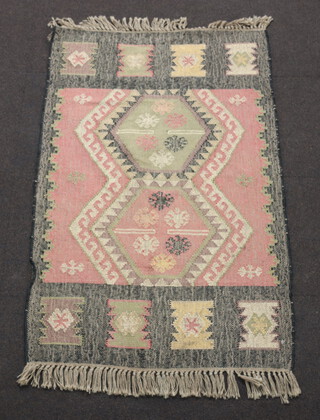 An Indian tan and black ground Kilim rug 98cm x 154cm and 1 other 67cm x 97cm  